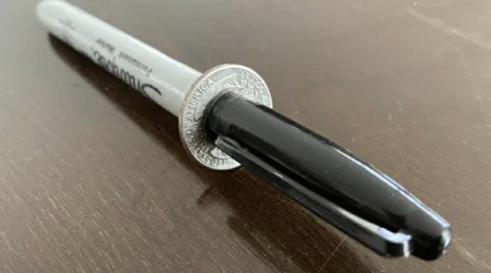 Tango - Sharpie thru Coin